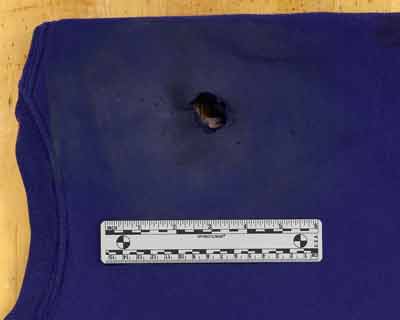 Gun shot residue on dark T-shirt